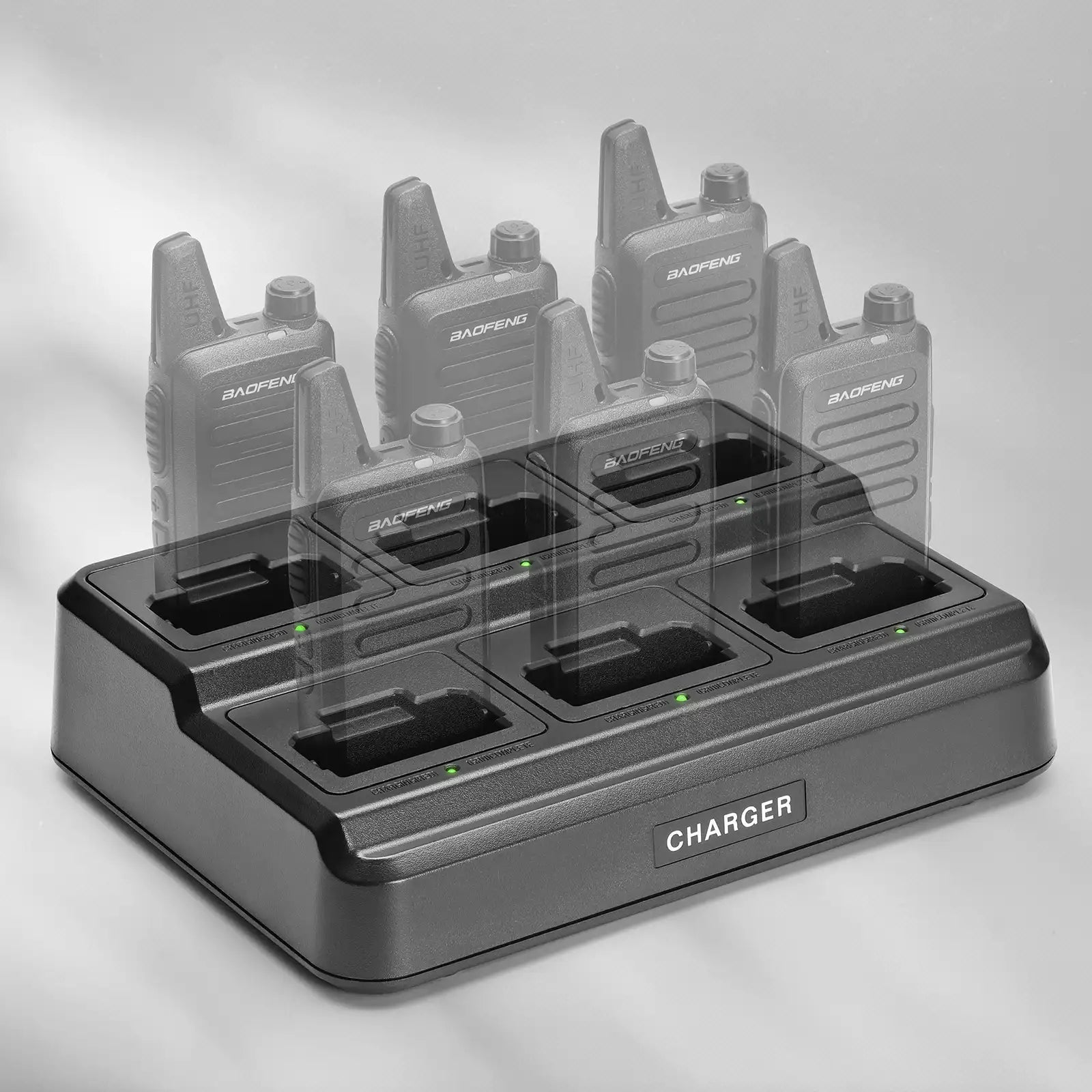 Set of walkie talkies on a charging station with 'BaoFeng' branding.