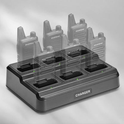 Set of walkie talkies on a charging station with 'BaoFeng' branding.