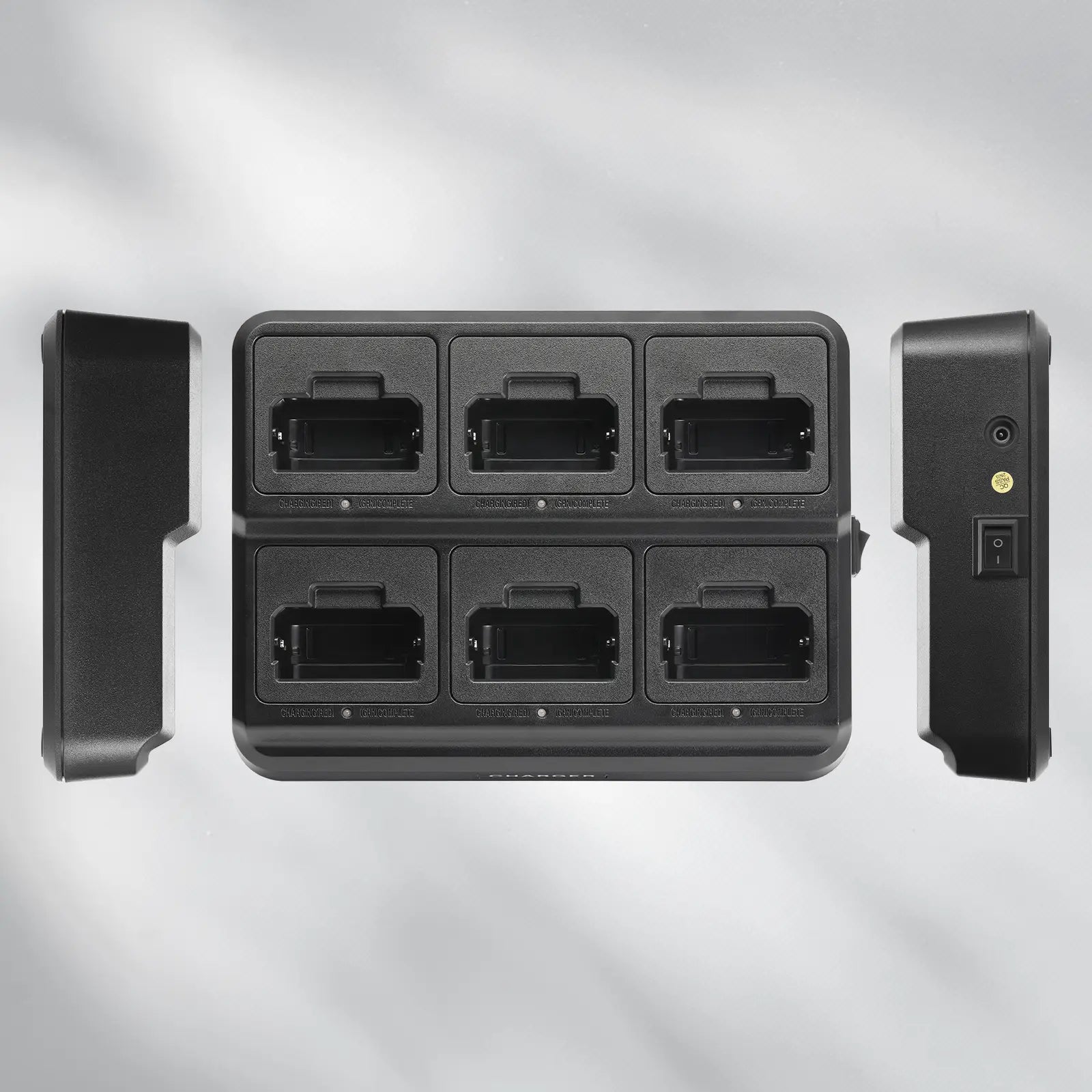 Black electronic device with multiple ports on a gray background