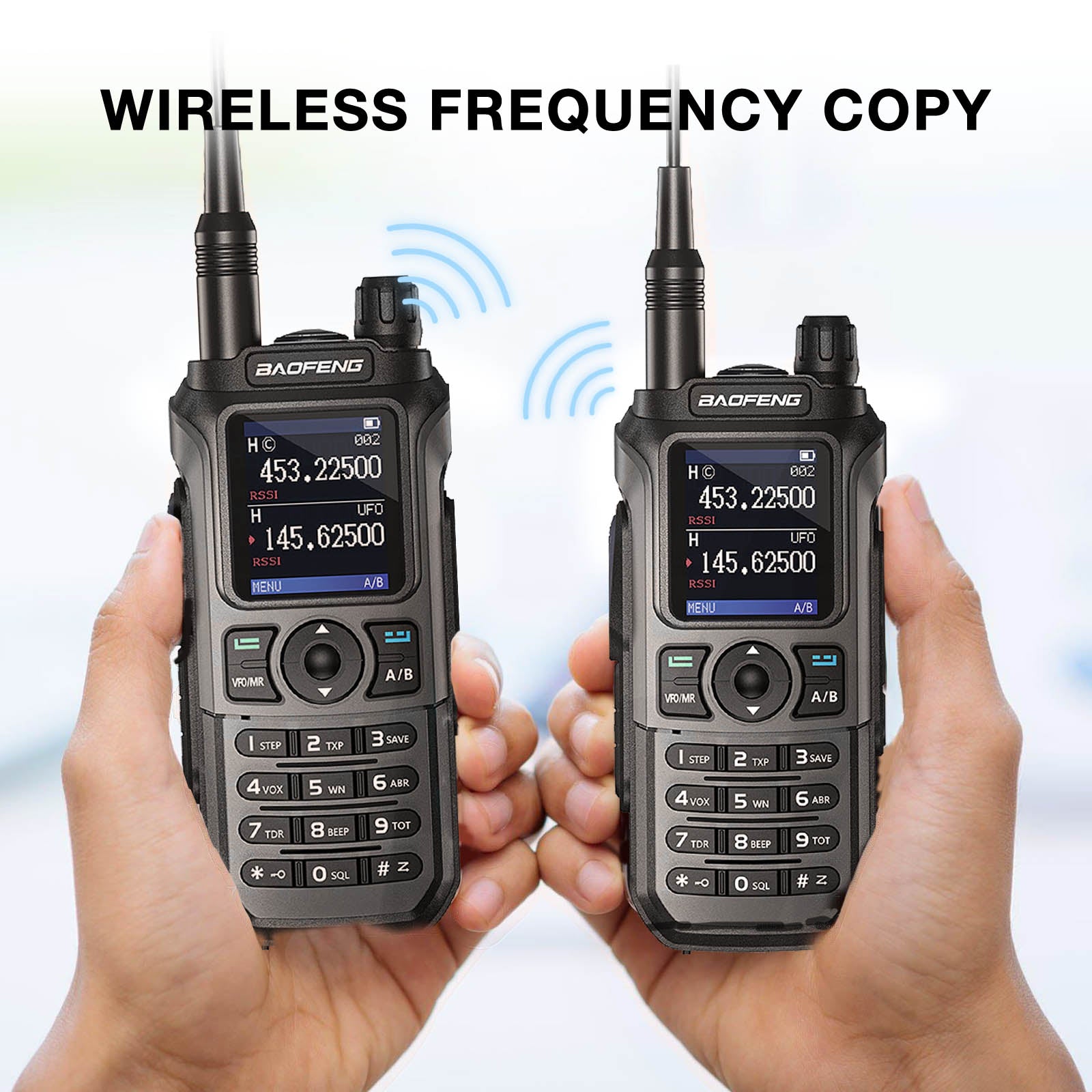 Two UV-21R radios with digital displays held in hands against a light background